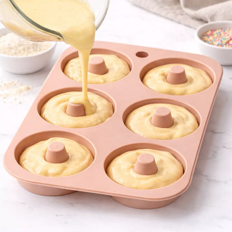 صب خليط الدونات داخل قالب سيليكون – Pouring Donut Batter into Silicone Mold