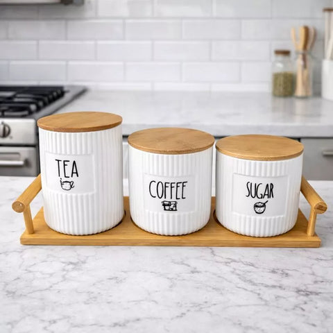 تفاصيل برطمانات Tea Coffee Sugar سيراميك بغطاء خشب وتصميم مضلع – Close-up of ceramic tea coffee sugar jars with wooden lids and ribbed design